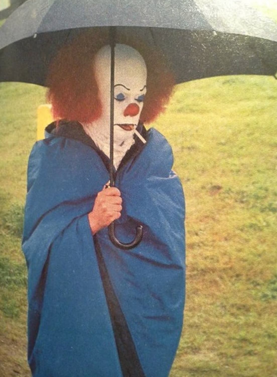 tim curry umbrella